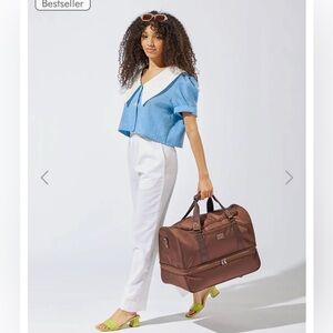 Nwt calpak stevyn duffel in sold out color walnut!!!